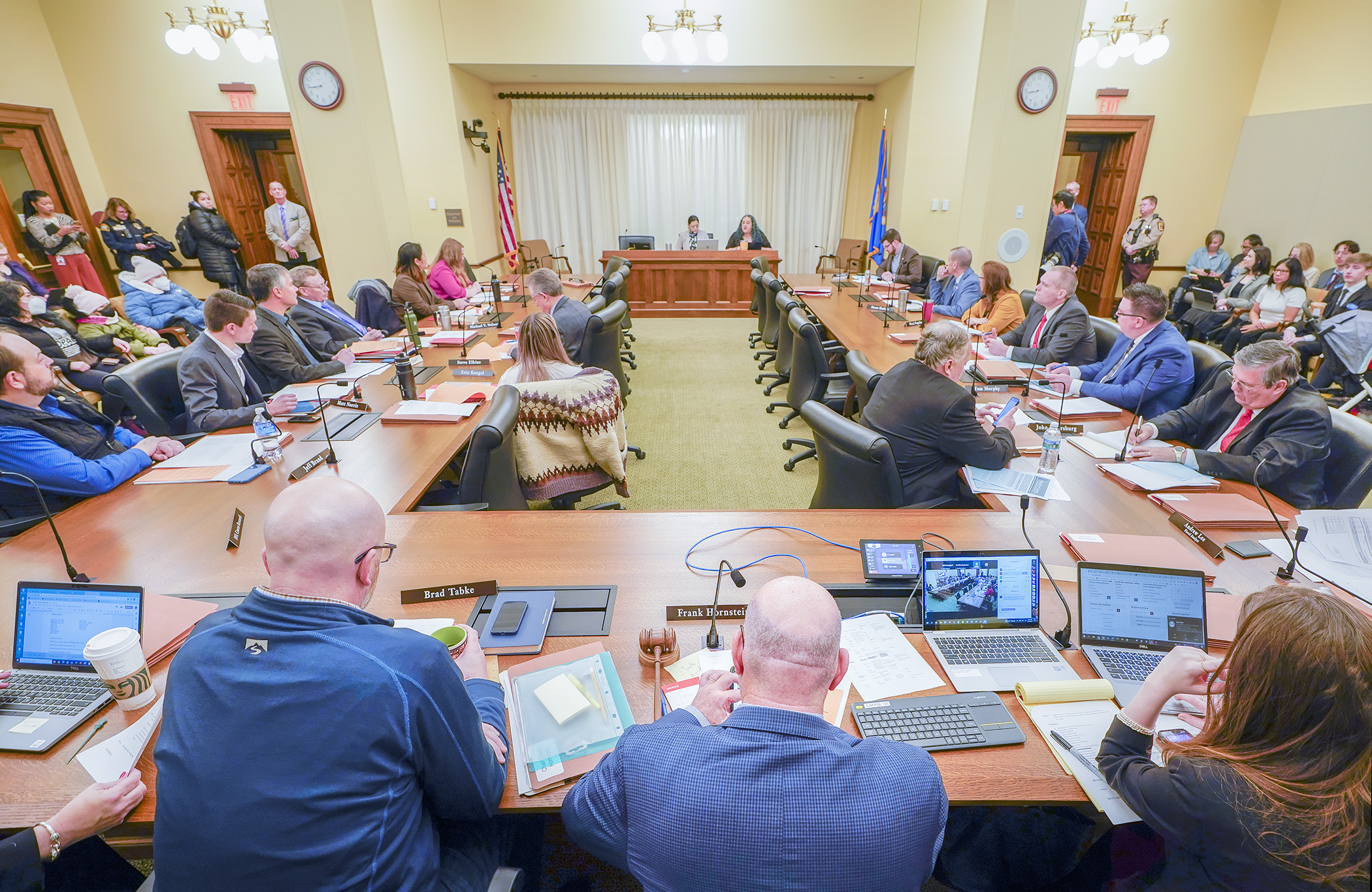 House transportation committee members listen Jan. 10 as Rep. Aisha Gomez and Rep. María Isa Pérez-Vega present HF4, a bill that would eliminate proof of citizenship or lawful U.S. presence to obtain a driver’s license or state ID. (Photo by Andrew VonBank)